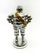 'Michelin Man' chrome plated figure