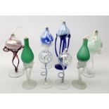 Pair of Art glass oil lamps on sinuous glass supports