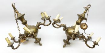 Pair of bronzed six-branch chandeliers of Dutch 17th century style, each with bulbous knopped colum