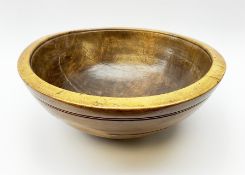 Early 19th century sycamore dairy bowl with turned banding to exterior