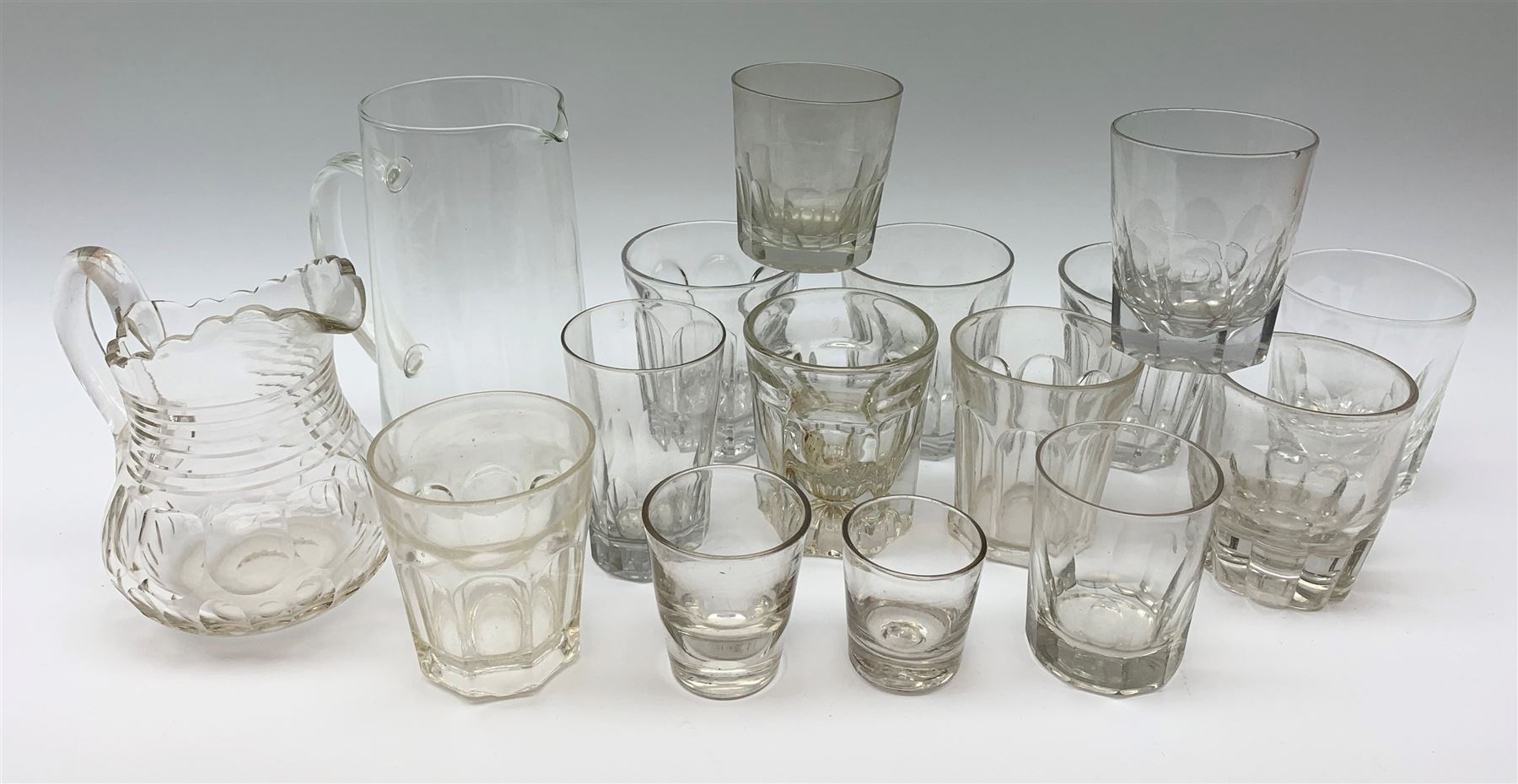 A group of 19th century moulded and slice cut glass tumblers