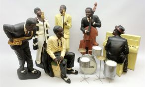 A group of six large composite Jazz Band figures comprising Pianist
