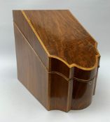 A large mahogany Georgian style serpentine fronted box