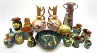 Collection of Devon pottery all having floral slip decoration and include Aller Vale