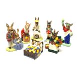 A group of seven Royal Doulton Bunnykins figures