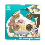 Royal Mint 2002 Manchester Commonwealth Games 'The Official Souvenir Coin Set' of four two pound coi