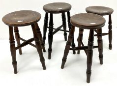 Four country wood stools