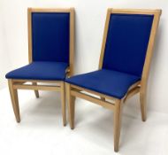 Set twenty beech framed banquet chairs upholstered in a blue fabric