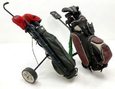 A quantity of golf clubs and two bags and trolleys