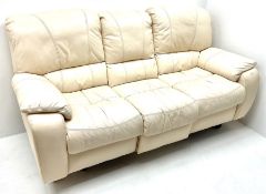 Three seat electric reclining sofa upholstered in a cream leather