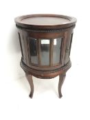 20th century mahogany circular bijouterie cabinet