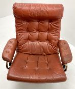 Mid 20th century swivel chair upholstered in buttoned tan leather