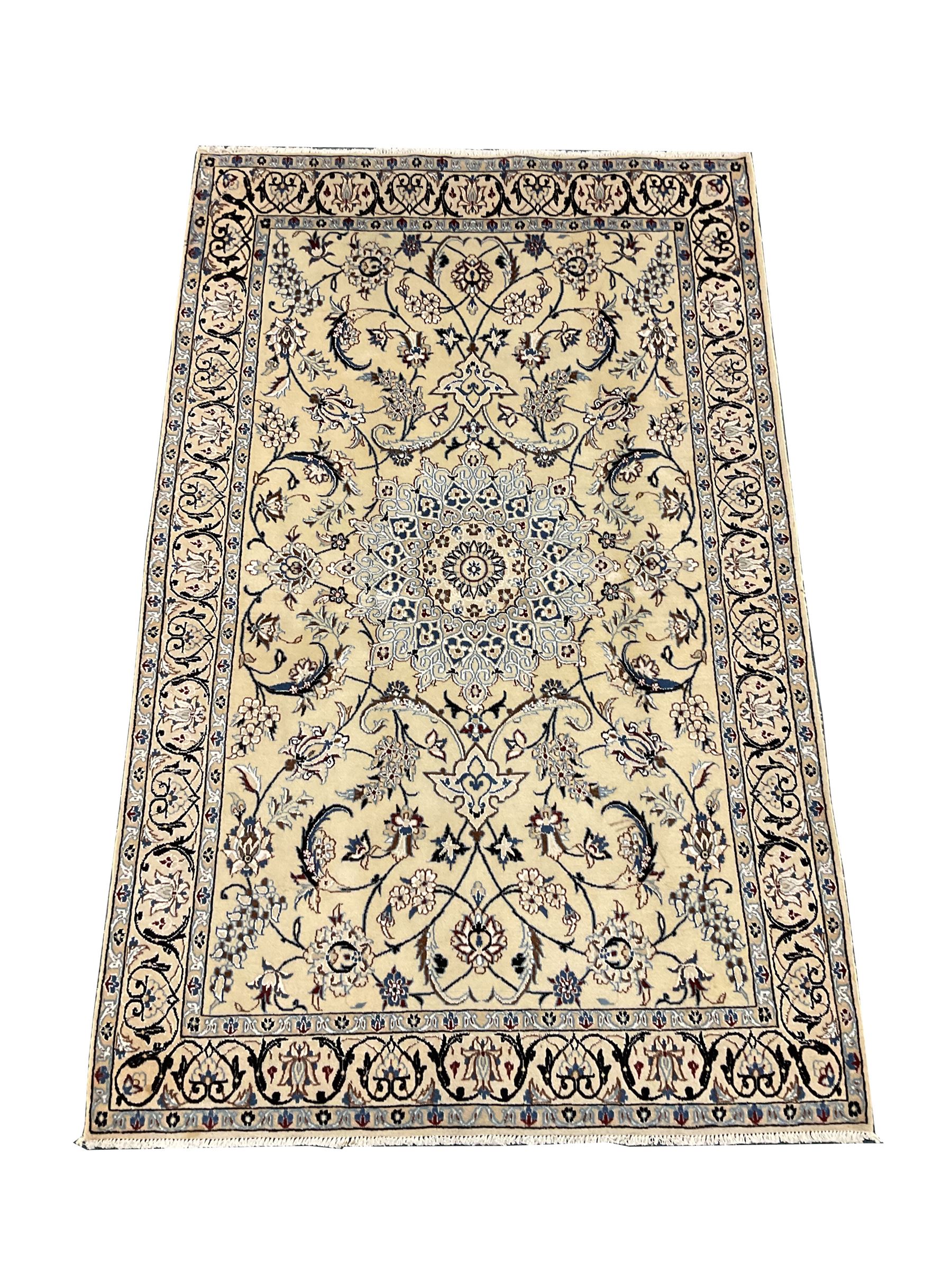 Fine Kashan ivory ground rug