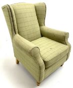 Next Sherlock wingback armchair upholstered in a light green chequered fabric