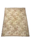 Early 20th century beige ground carpet decorated with flowers and foliage