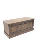 Oak lowline cabinet with two fielded panel doors