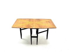 Mid 20th century retro teak drop leaf dining table with striped orange decoration on black painted b