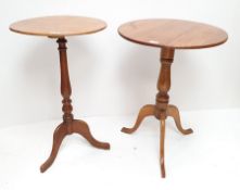 Two pedestal occasional tables