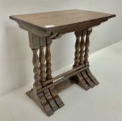 Early 20th century medium oak nest of three tables