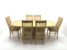 Oval maple extending dining table