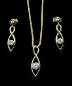 Gold diamond marquise shaped pendant necklace and pair of matching pendant stud earrings