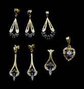 Two sets of gold matching sapphire and diamond stud pendant earrings and pendants and one other sapp