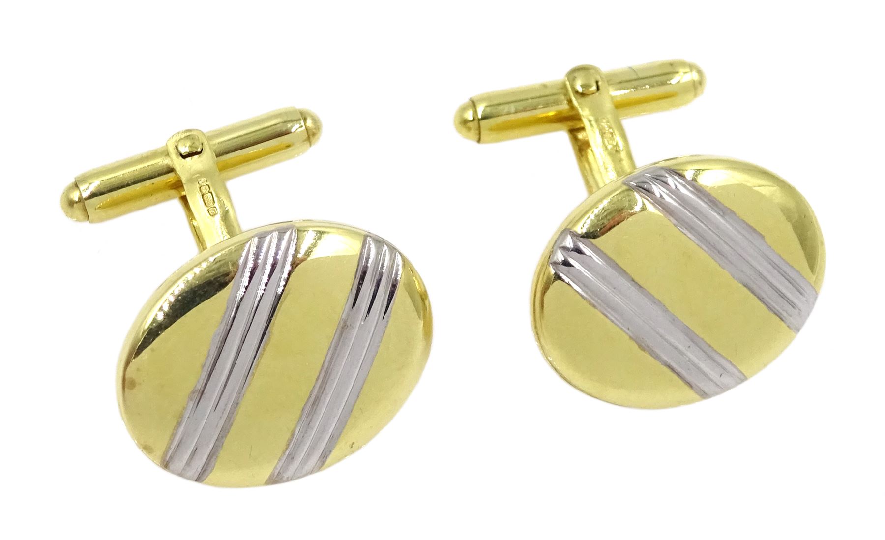 Pair of 9ct white and yellow gold oval cufflinks