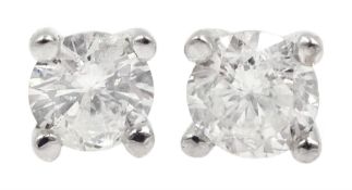 Pair of 18ct white gold round brilliant cut diamond stud earrings