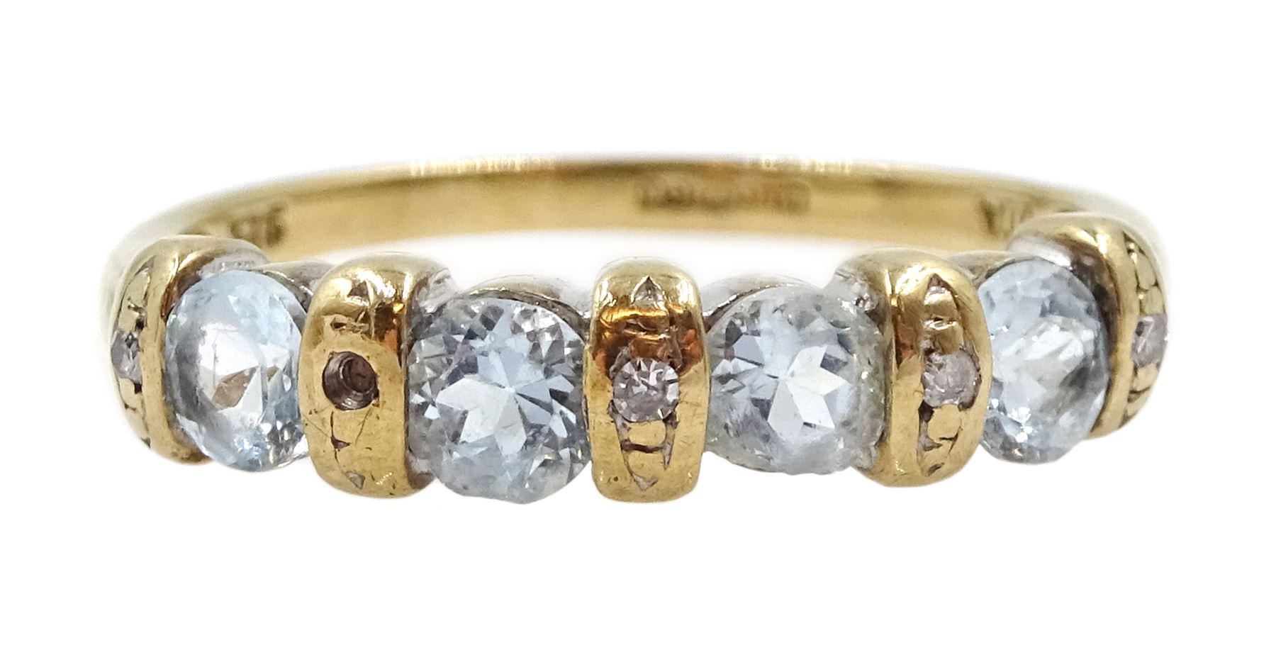9ct gold four stone topaz ring