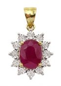 Gold oval ruby and round brilliant cut diamond pendant