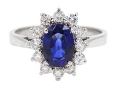 18ct white gold oval sapphire and diamond cluster ring