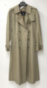 A ladies Burberry trench coat