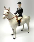 A Beswick equestrian figure modelled as a huntswoman on grey horse