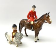 A Beswick equestrian figure modelled as a huntsman on bay horse