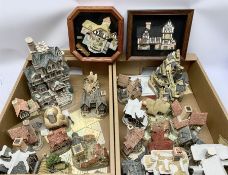 A collection of boxed David Winter Cottages