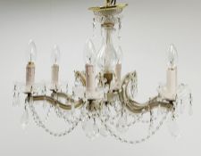 A glass chandelier, with six curved branches supporting glass swags and droppers, approximately H39c