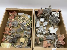 A collection of boxed David Winter cottages