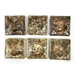 A set of six late 19th/early 20th century mottles green and brown glazed tiles