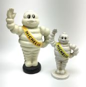 A cast iron Michelin man type money box