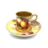 A Royal Worcester fruit painted cabinet coffee can and saucer