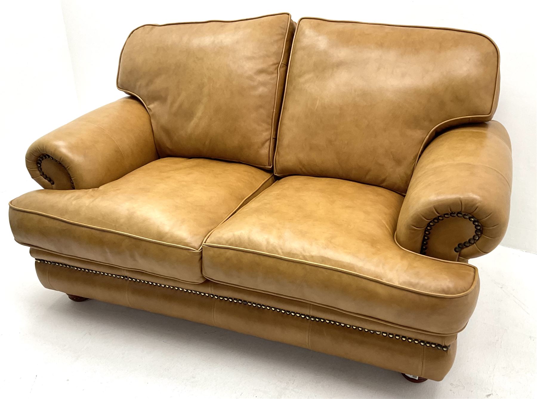 Two seat sofa upholstered in a studded tan leather - Image 3 of 7