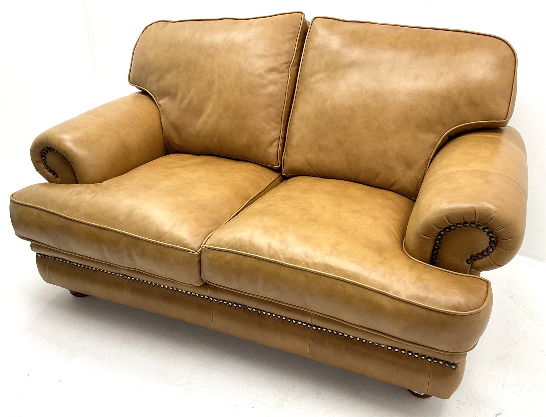 Two seat sofa upholstered in a studded tan leather - Image 4 of 7