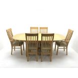 Oval maple extending dining table