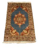 Persian style blue ground rug