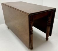 Early 19th century mahogany drop leaf dining table