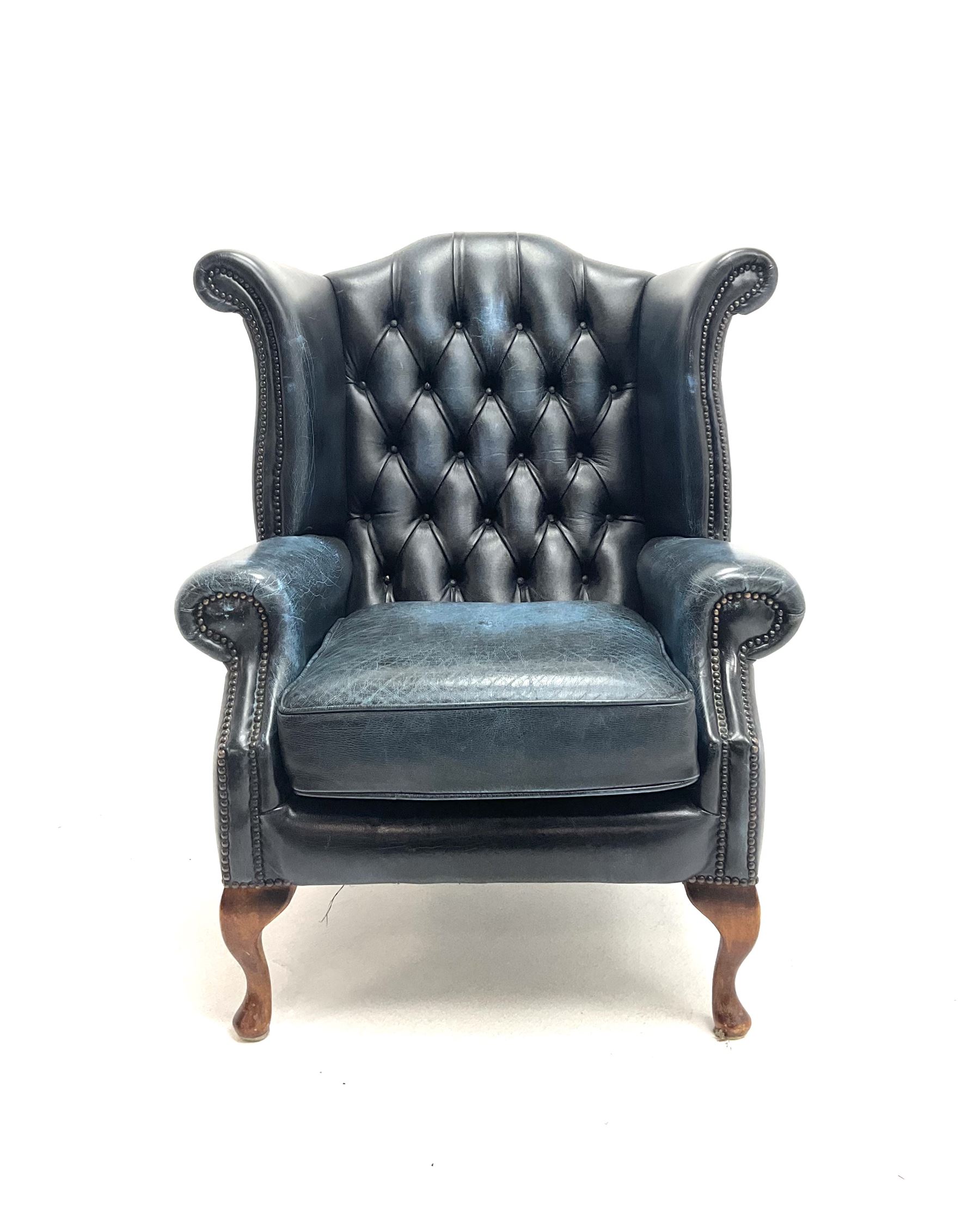 Queen Anne style wing back deep button armchair