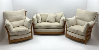 Ercol 'Renaissance' light ash framed three piece suite - three seat sofa and pair matching armchairs