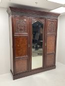 Late Victorian walnut triple wardrobe