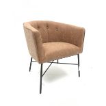 Tub shaped easy chair upholstered in tan faux leather