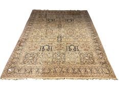 Large Persian design beige ground carpet